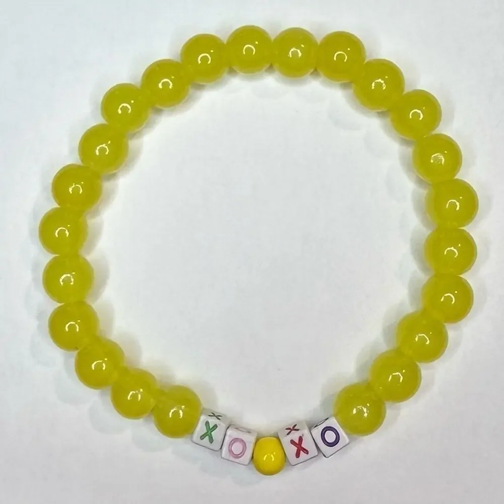 XO yellow handmade bracelet 8mm glass beads friendship